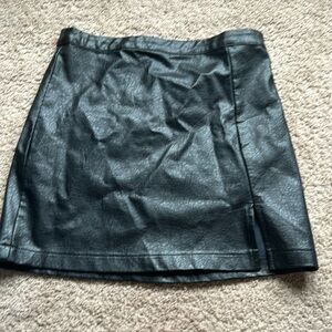 Black leather mini skirt